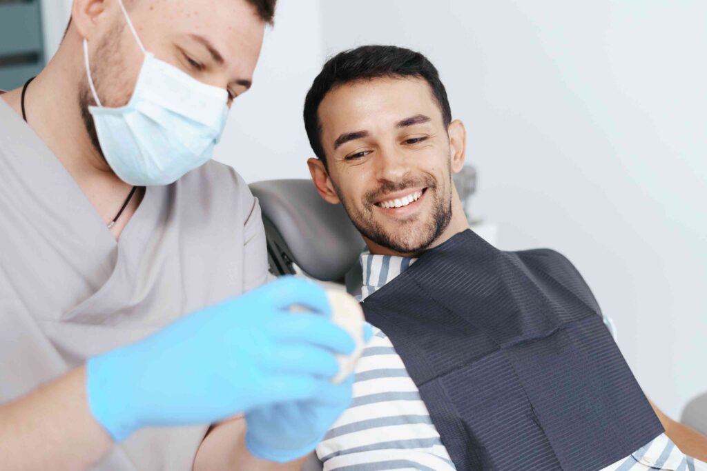 Dentist providing dental care to a patient